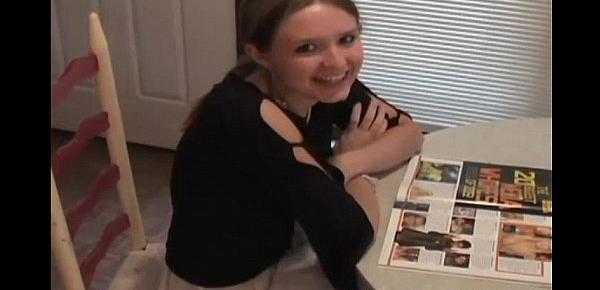  Cute teen Kitty reading a magazine and flashing her panties